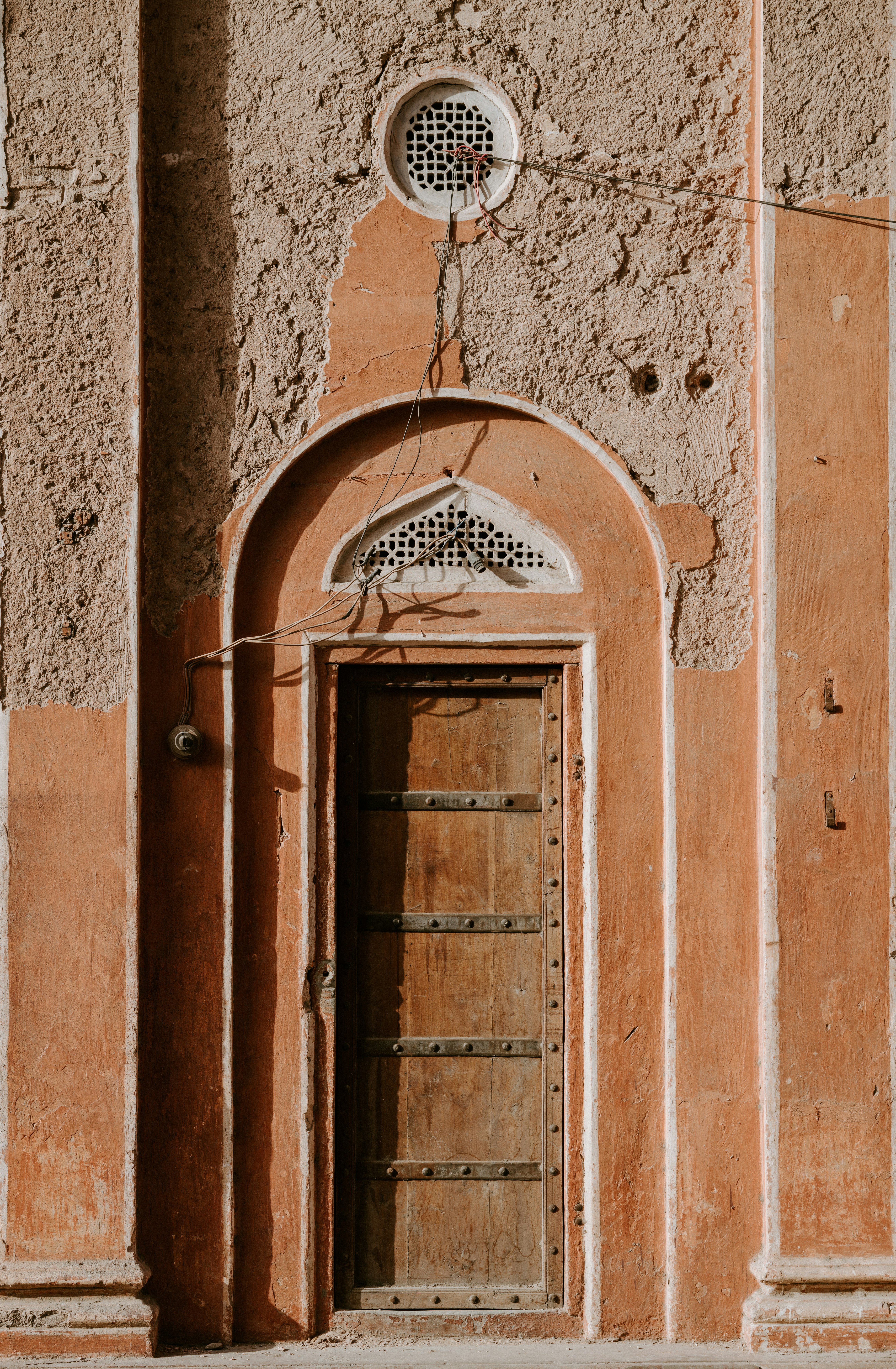 photo of closed brown wooden door